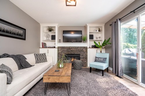 7988 Melburn Drive, Mission, BC - Indoor Photo Showing Living Room With Fireplace