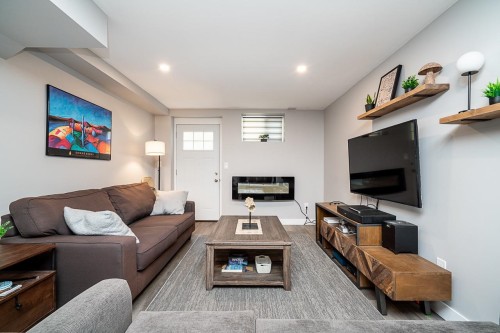 7988 Melburn Drive, Mission, BC - Indoor Photo Showing Living Room With Fireplace