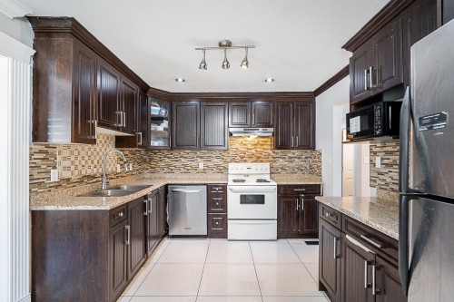 12892 111 Avenue, Surrey, BC - Indoor Photo Showing Kitchen With Double Sink With Upgraded Kitchen