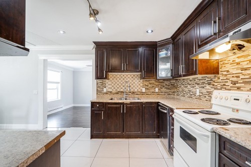 12892 111 Avenue, Surrey, BC - Indoor Photo Showing Kitchen With Double Sink