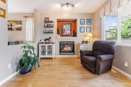 14876 56A Avenue, Surrey, BC - Indoor Photo Showing Living Room With Fireplace