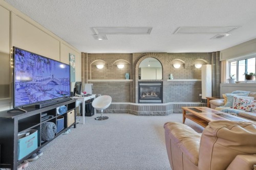19717 48A Avenue, Langley, BC - Indoor Photo Showing Living Room With Fireplace