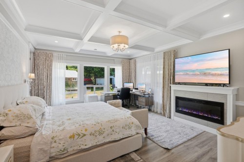 11554 92A Avenue, Delta, BC - Indoor Photo Showing Bedroom With Fireplace