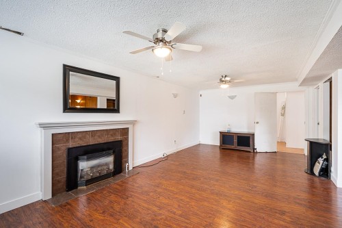 11380 75B Avenue, Delta, BC - Indoor Photo Showing Living Room With Fireplace