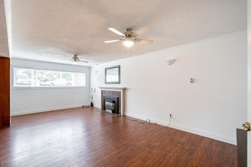 11380 75B Avenue, Delta, BC - Indoor Photo Showing Living Room With Fireplace