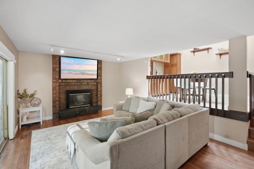 11779 Lyon Road, Delta, BC - Indoor Photo Showing Living Room With Fireplace