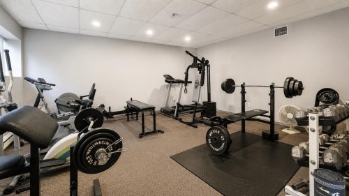 109-33599 2 Avenue, Mission, BC - Indoor Photo Showing Gym Room