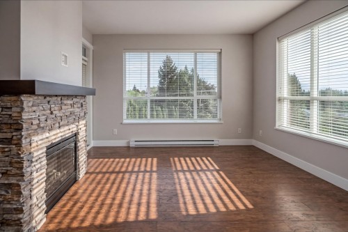 303-3192 Gladwin Road, Abbotsford, BC - Indoor With Fireplace