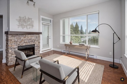 303-3192 Gladwin Road, Abbotsford, BC - Indoor Photo Showing Living Room With Fireplace