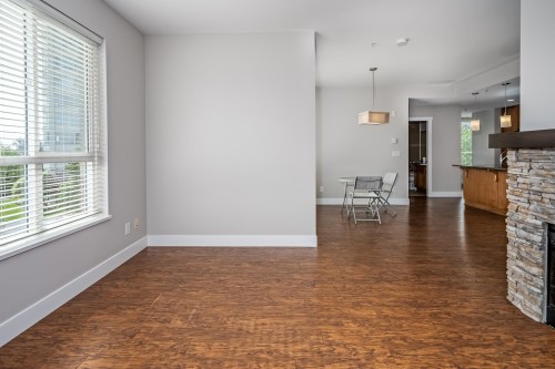 303-3192 Gladwin Road, Abbotsford, BC - Indoor With Fireplace