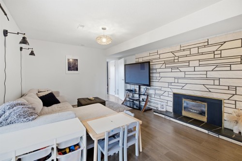 1970 Powell Crescent, Abbotsford, BC - Indoor Photo Showing Living Room With Fireplace