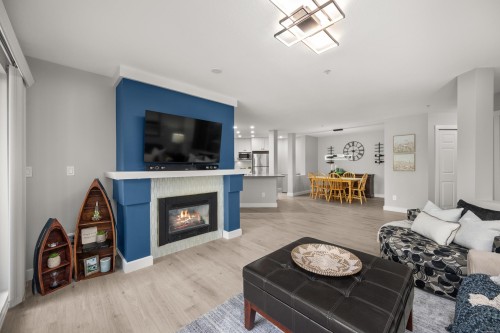 202-22015 48 Avenue, Langley, BC - Indoor Photo Showing Living Room With Fireplace