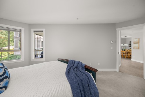 202-22015 48 Avenue, Langley, BC - Indoor Photo Showing Bedroom