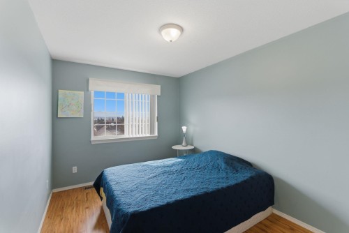 7935 Topper Drive, Mission, BC - Indoor Photo Showing Bedroom
