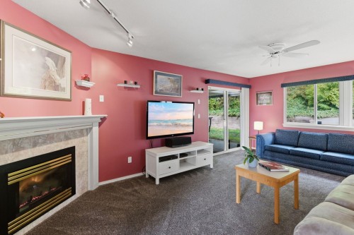 7935 Topper Drive, Mission, BC - Indoor Photo Showing Living Room With Fireplace
