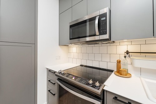 202-14968 101A Avenue, Surrey, BC - Indoor Photo Showing Kitchen With Upgraded Kitchen