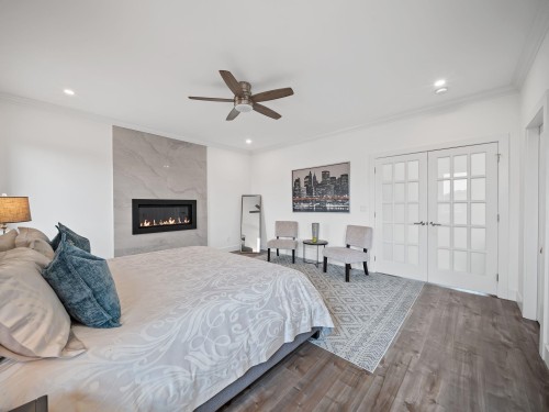 20574 71 Avenue, Langley, BC - Indoor Photo Showing Bedroom With Fireplace