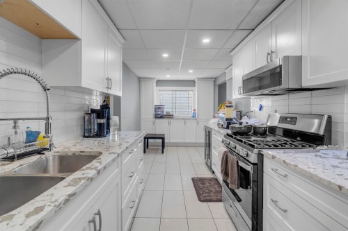 14115 110 Avenue, Surrey, BC - Indoor Photo Showing Kitchen With Double Sink With Upgraded Kitchen