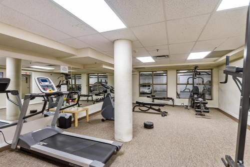 301-10499 University Drive, Surrey, BC - Indoor Photo Showing Gym Room