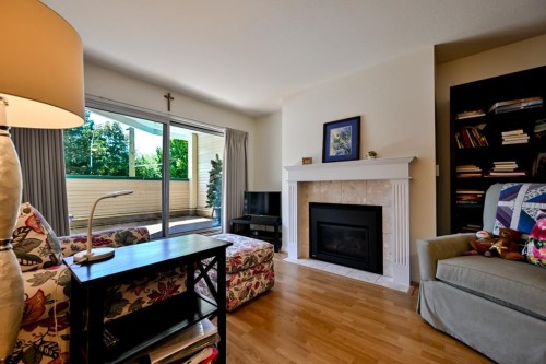 101-20727 Douglas Crescent, Langley, BC - Indoor Photo Showing Living Room With Fireplace