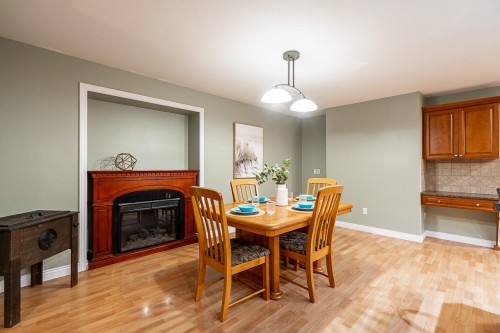 26880 25A Avenue, Langley, BC - Indoor Photo Showing Dining Room With Fireplace