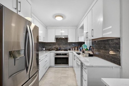 12079 84A Avenue, Surrey, BC - Indoor Photo Showing Kitchen With Upgraded Kitchen