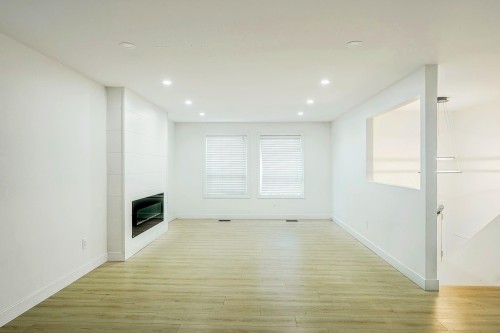 2418 Wayburne Crescent, Langley, BC - Indoor Photo Showing Other Room With Fireplace