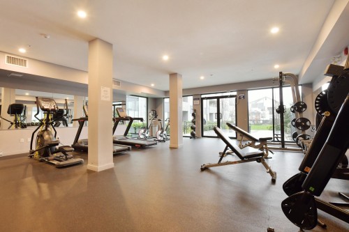306-15848 Fraser Highway, Surrey, BC - Indoor Photo Showing Gym Room