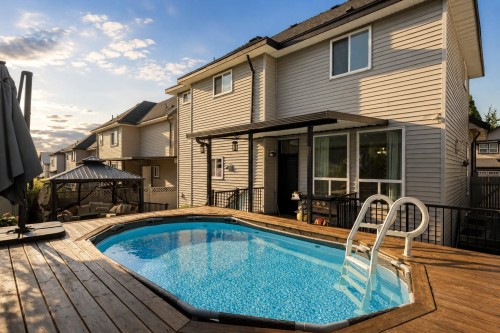 18080 67 Avenue, Surrey, BC - Outdoor With Above Ground Pool With Deck Patio Veranda With Exterior