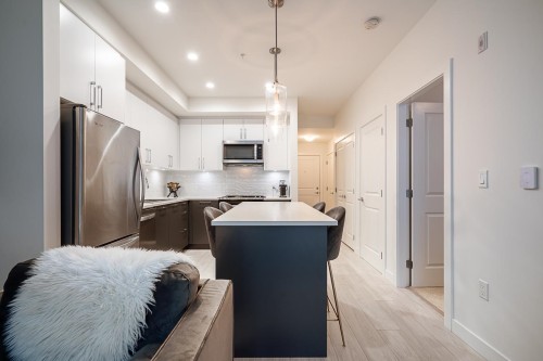 B228-20834 80 Avenue, Langley, BC - Indoor Photo Showing Kitchen With Stainless Steel Kitchen With Upgraded Kitchen