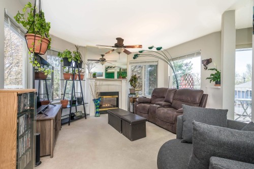 203-33669 2Nd Avenue, Mission, BC - Indoor Photo Showing Living Room With Fireplace