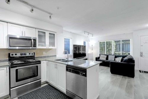 108-13958 108 Avenue, Surrey, BC - Indoor Photo Showing Kitchen With Double Sink