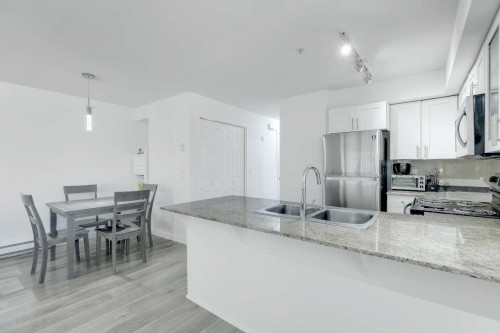 108-13958 108 Avenue, Surrey, BC - Indoor Photo Showing Kitchen With Double Sink With Upgraded Kitchen