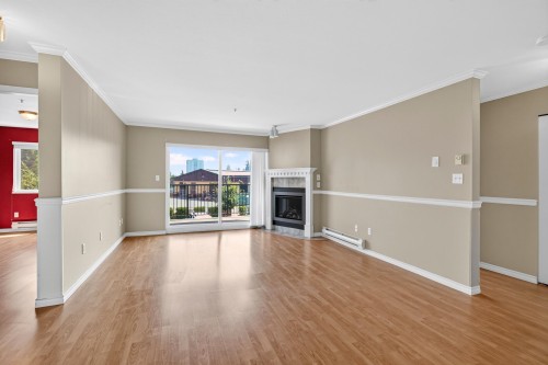 212-32044 Old Yale Road, Abbotsford, BC - Indoor Photo Showing Living Room With Fireplace
