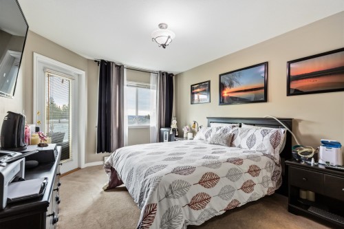 309-7554 Briskham Street, Mission, BC - Indoor Photo Showing Bedroom
