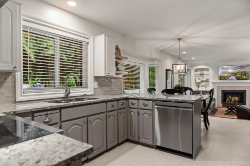 34849 Everett Drive, Abbotsford, BC - Indoor Photo Showing Kitchen With Fireplace With Double Sink