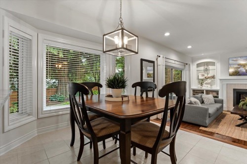34849 Everett Drive, Abbotsford, BC - Indoor Photo Showing Dining Room With Fireplace