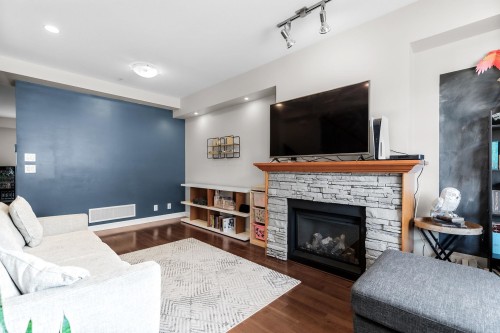 112-20738 84 Avenue, Langley, BC - Indoor Photo Showing Living Room With Fireplace