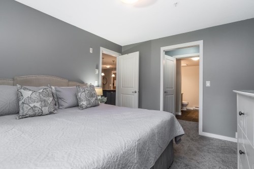 107-2990 Boulder Street, Abbotsford, BC - Indoor Photo Showing Bedroom