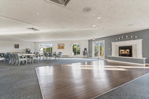 118-1450 Mccallum Road, Abbotsford, BC - Indoor Photo Showing Other Room With Fireplace