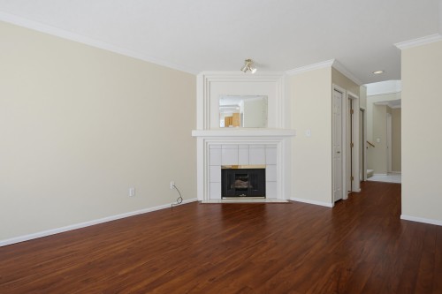 107-15988 83 Avenue, Surrey, BC - Indoor Photo Showing Living Room With Fireplace