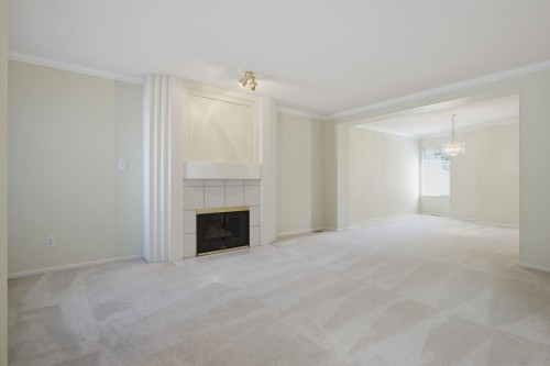 107-15988 83 Avenue, Surrey, BC - Indoor Photo Showing Living Room With Fireplace