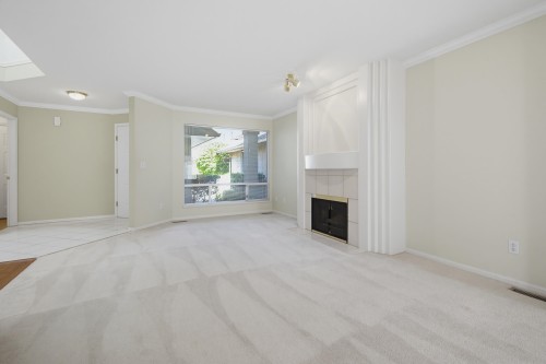 107-15988 83 Avenue, Surrey, BC - Indoor With Fireplace