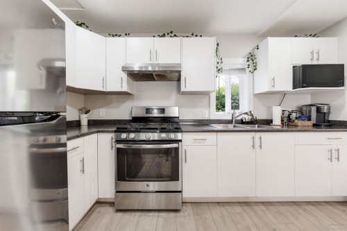 6709 216 Street, Langley, BC - Indoor Photo Showing Kitchen With Double Sink