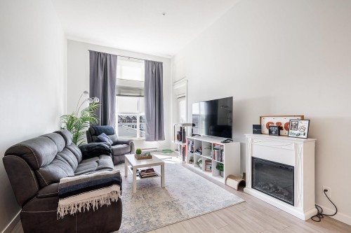 C620-8150 207 Street, Langley, BC - Indoor Photo Showing Living Room With Fireplace