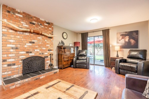 6811 Baker Road, Delta, BC - Indoor Photo Showing Living Room With Fireplace