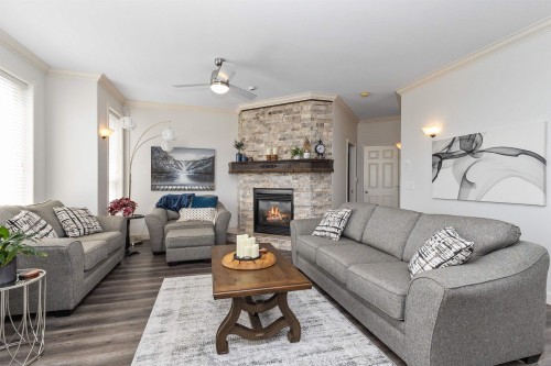 2764 St Moritz Way, Abbotsford, BC - Indoor Photo Showing Living Room With Fireplace