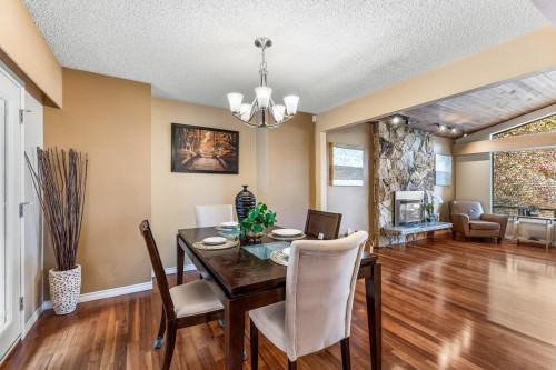 6457 Summit Crescent, Delta, BC - Indoor Photo Showing Dining Room With Fireplace