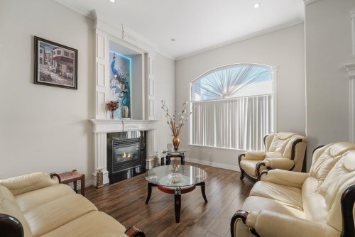 8032 Melburn Drive, Mission, BC - Indoor Photo Showing Living Room With Fireplace