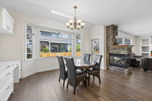 19661 73B Avenue, Langley, BC - Indoor Photo Showing Dining Room With Fireplace